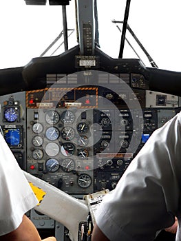 Malaysia. Pilots at Cockpit Controls