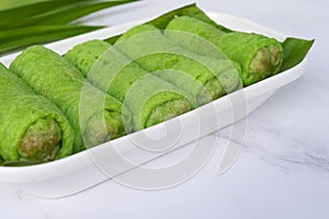 Malaysia popular kuih ketayap assorted sweet dessert with coconut known.