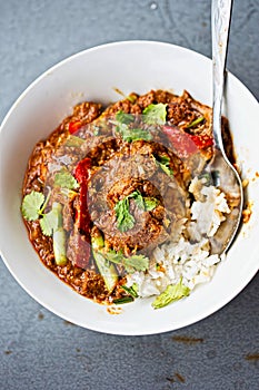Malaysian beef curry with scallions and peppers