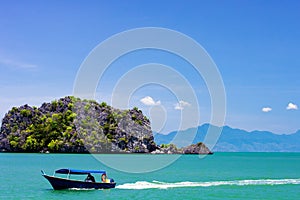 Malaysian boat near beach on the island of Langkawi