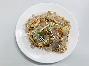 Malaysian Char Kway Teow in white plate.