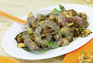 Malaysian cuisine. Spicy sambal cockles