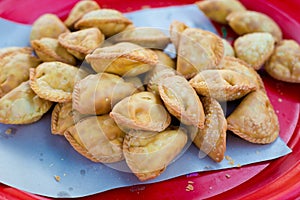 Malaysian deepfried dumplings on market photo