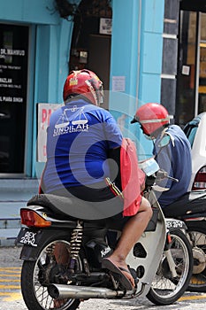 Malaysian Man Wearing A Barisan Nasional T-Shirt