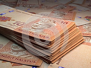 Malaysian money. Malaysian ringgit banknotes. 10 MYR ringgits bills photo