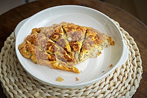 Malaysian omelete or telur dadar served on the table