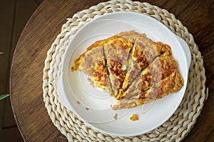 Malaysian omelete or telur dadar served on the table