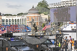 Malaysian Police's assault vehicle with VAT 69 Commando personnel during 65th Malaysia National Day in Kuala Lumpur.