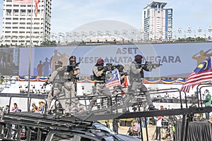 Malaysian Police's assault vehicle with VAT 69 Commando personnel during 65th Malaysia National Day in Kuala Lumpur.