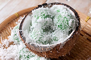 Malaysian traditional cake Ondeh Ondeh or Kelepon for Indonesian. Glutinous rice ball, palm sugar, grated coconut