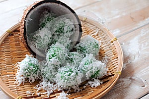 Malaysian traditional cake Ondeh Ondeh or Kelepon for Indonesian. Malaysia, glutinous rice ball, palm sugar, grated coconut