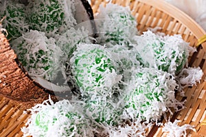 Malaysian traditional cake Ondeh Ondeh or Kelepon for Indonesian. Malaysia, glutinous rice ball, palm sugar, grated coconut