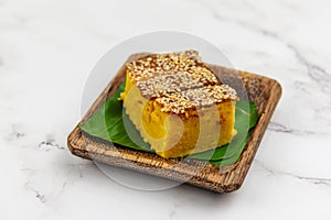 Malaysian Traditional Dessert on a Plate - Kuih Bingka Ubi photo