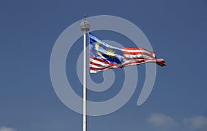 Malaysiaâ€™s flag flutter at the Independence square in Kuala Lumpur.