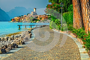 Malcesine cityscape with promeande and lake Garda, Veneto region, Italy