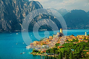 Malcesine tourist resort with castle view from the hill, Italy