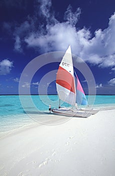 Maldives catamaran on tropical beach