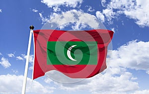 Maldives Flag Mockup, fluttering under blue sky