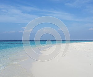 Maldives. Journey to a desert island. Azure ocean and white sand. Paradise Island.