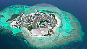 Maldives paradise island Bodufolhudhoo with turquoise sea on Alif Alif Ari Atoll. Aerial drone video.