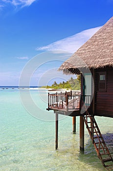 Maldives paradise water bungalow photo