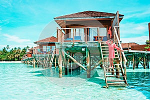 Maldives tropical Island, beautiful  luxury water bungalows Maldives in the blue green ocean of the maldives