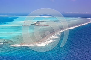 Maldives vacation paradise sea island atoll lagoon aerial photo