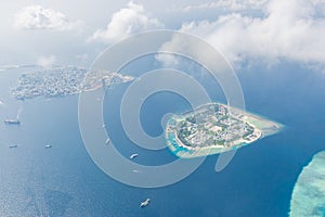 Maldivian capital city Male from above, blue sea and boats
