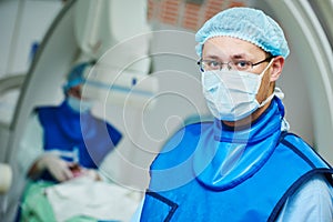 Male andiography surgeon at surgery operating room photo