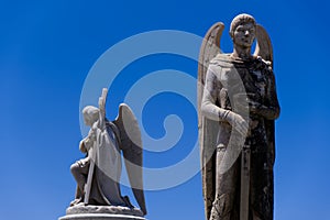 Male, Angel Statues in Cemetery