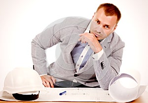 Male architect or engineer sitting at his desk