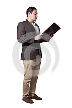 Male Asian businessman standing and holding document paper, full body length portrait isolated on white