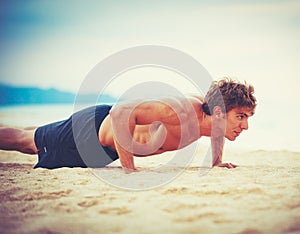 Male Athlete Exercising Doing Push-Ups