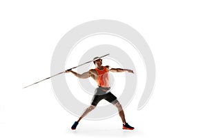 Male athlete practicing in throwing javelin isolated on white studio background