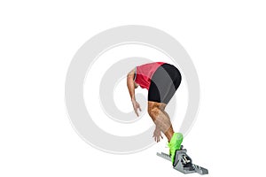 Male athlete running from starting blocks