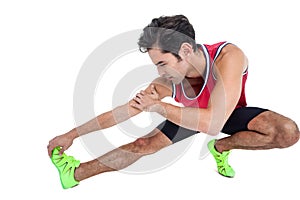 Male athlete stretching his hamstring