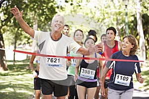 Male Athlete Winning Marathon Race