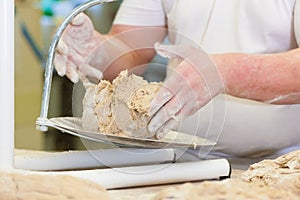Male baker baking bread