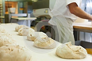 Male baker baking bread