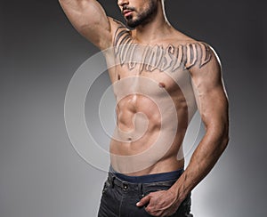 Male bare body with developed muscles photo