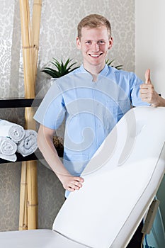 Male beautician with okay gesture