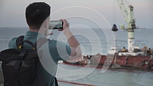 Male blogger is broadcasting live on social networks on journey near sunken tanker Delfi near Odessa. Black Sea coast