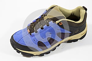 Male blue leather sneaker on white background, isolated product.