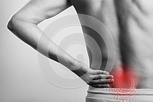 Male body lower spine injury pain
