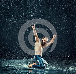 The male break dancer in water.