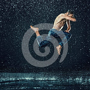 The male break dancer in water.