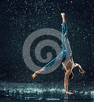 The male break dancer in water.