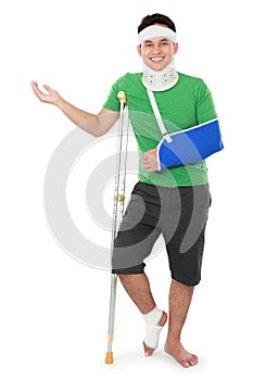 Male with broken arm and crutch presenting