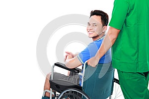 Male with broken arm and foot using wheel chair