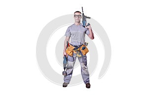 Male Builder in full growth, holding two drills, isolated on white background.